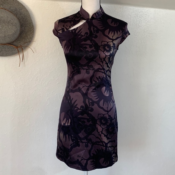 Guess Collection Dresses & Skirts - Guess Collection purple floral dress with chest peep hole Size 6